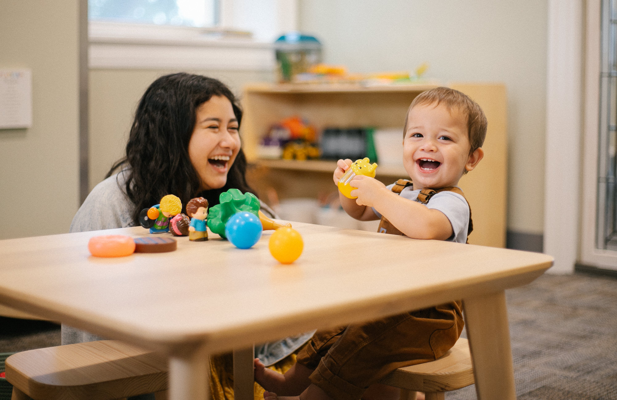 Baby in Childcare with teacher